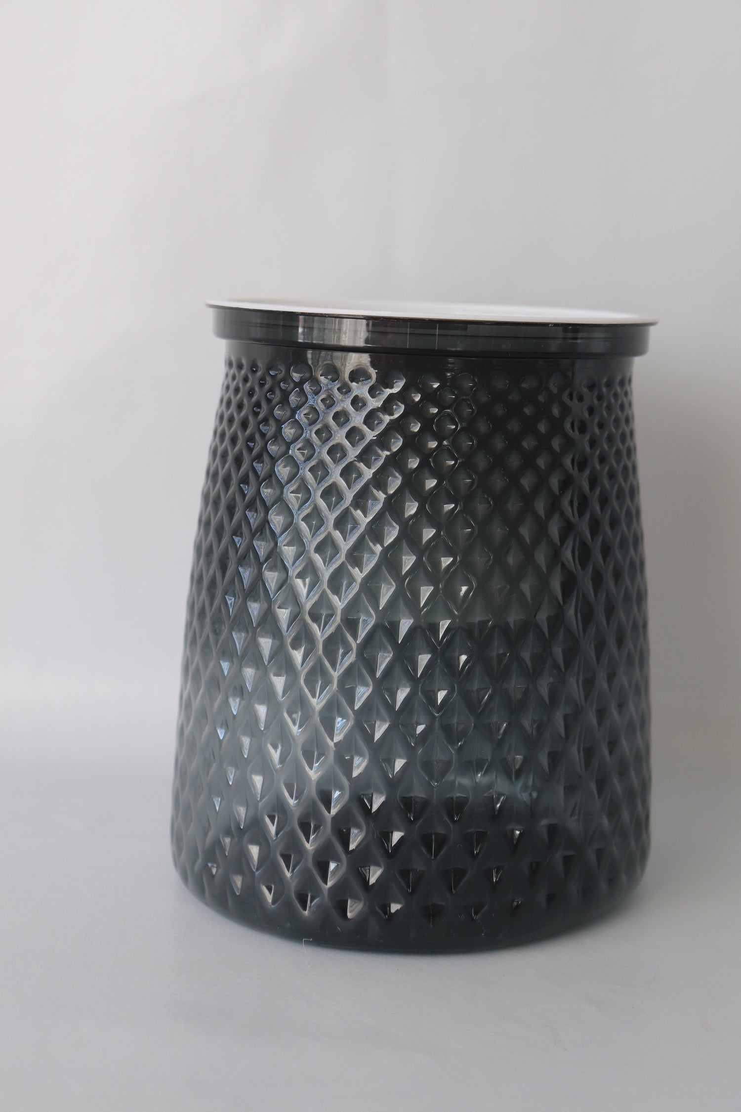 Grey Textured plastic self-watering planter with water reservoir for easy care