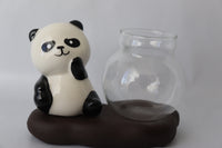 Sitting Panda propargation station with a small prop bowl