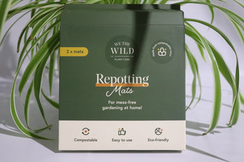 We The Wild Repotting Mat for mess-free plant care, eco-friendly and compostable, perfect for tidy repotting.