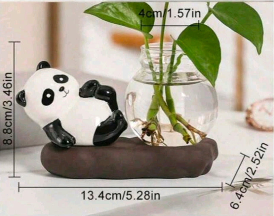 Panda-shaped decoration with a glass vase containing greenery on a white surface., showing measurments